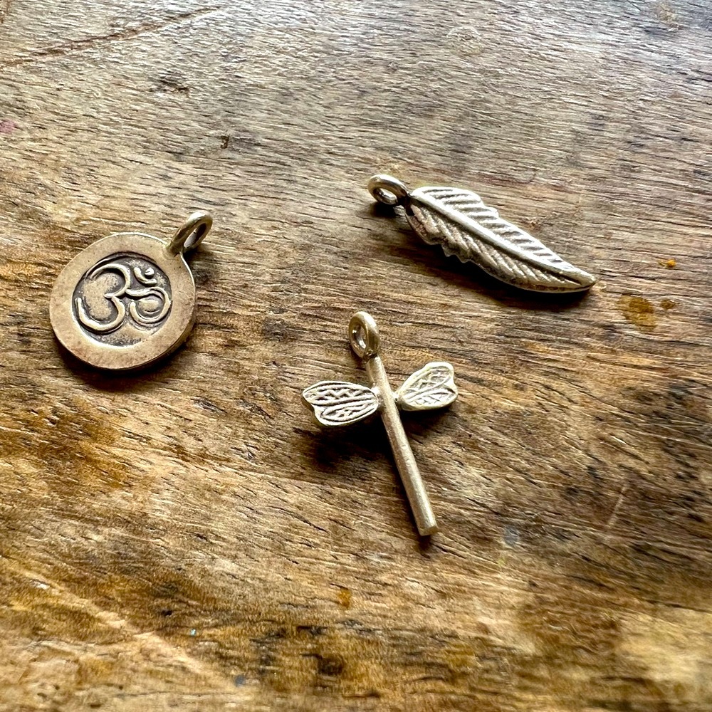 Pure silver Karen Hill Tribe charms.